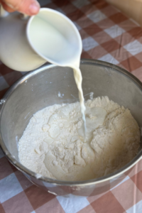 add milk to sourdough biscuit dough